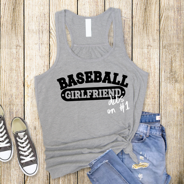 Light Grey Racer back tank top with "Baseball Girlfriend dips on Number 1" on it in black. 